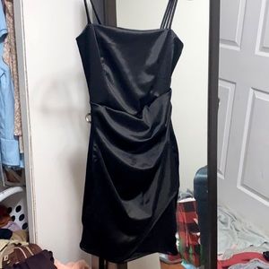 I am selling this silky black dress from Windsor and has little draping